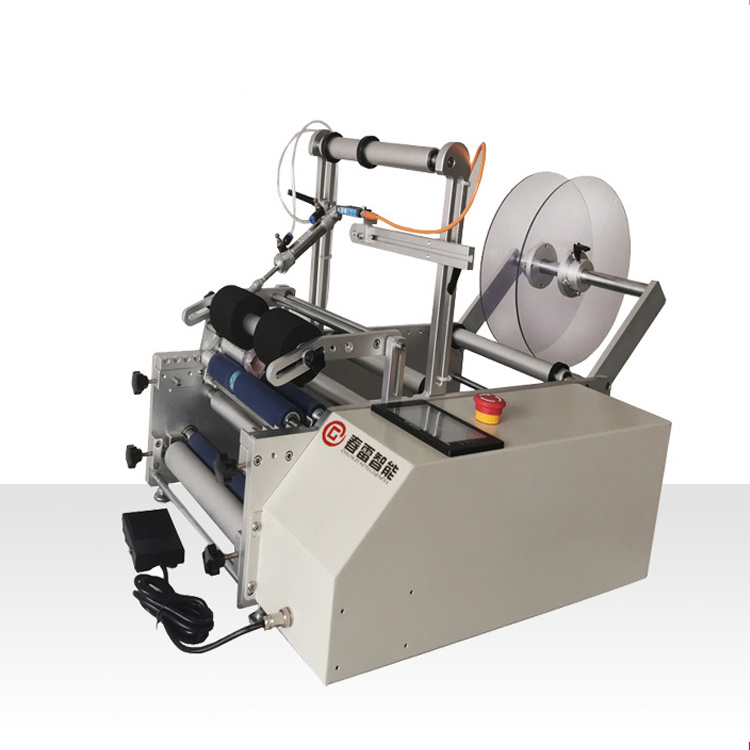 Semi - automatic adhesive labeling machine